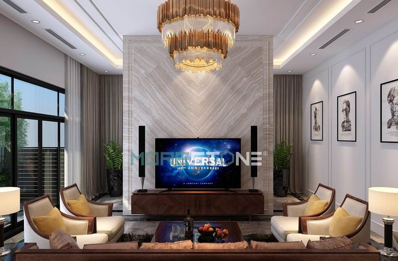 Sử dụng đá đối vân cao cấp để thiết kế vách tivi sẽ làm nổi bật và tạo ấn tượng cho không gian phòng khách.
